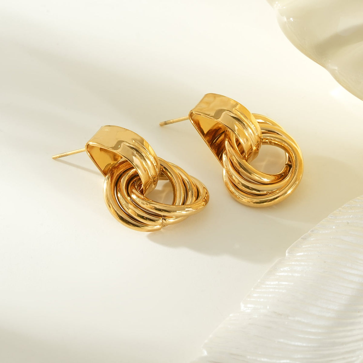 CALIGANTI Gold: Retro Style Intertwined Double Ring Earrings