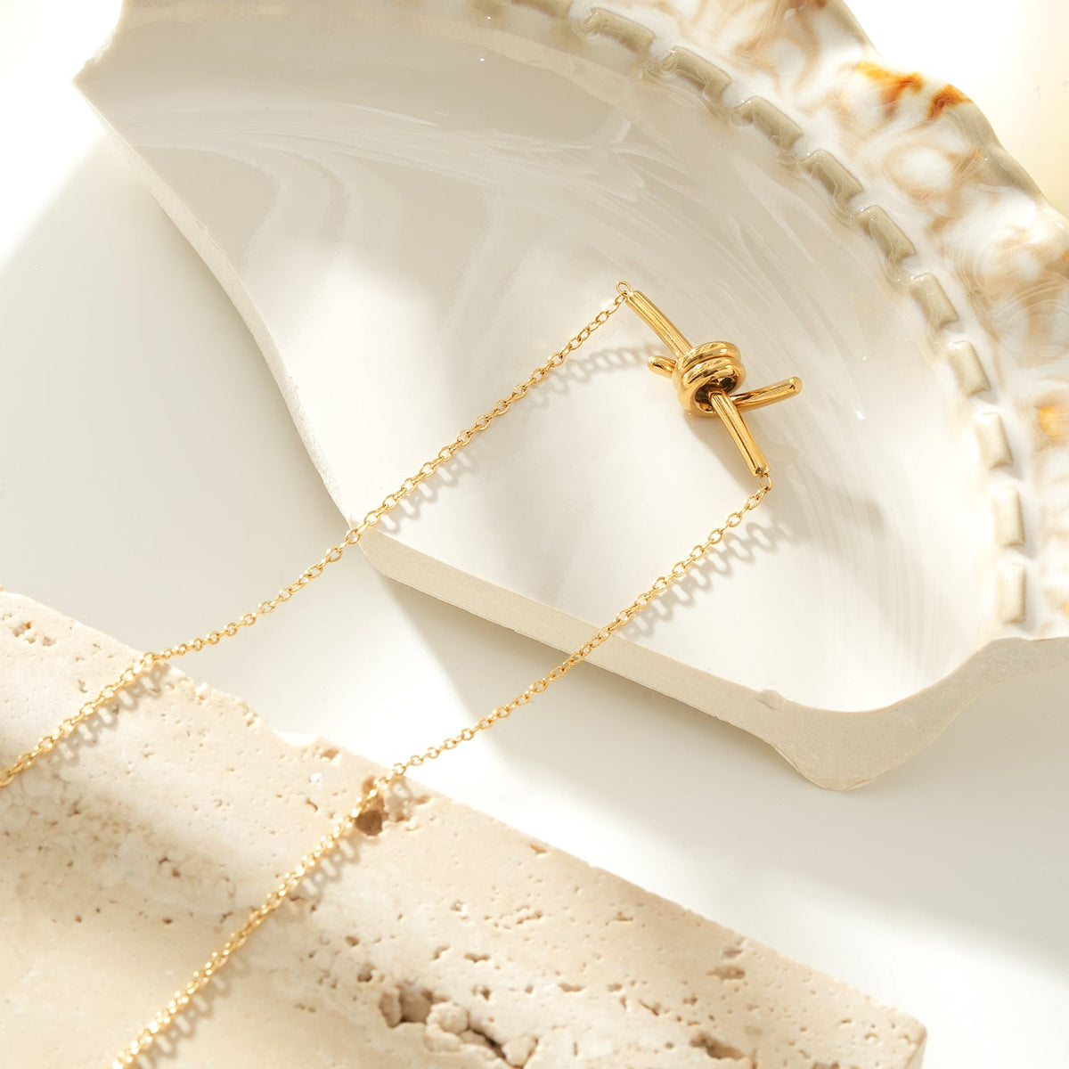 LARISA Gold: Bar Pendant Necklace with Knotted Symbol Detail